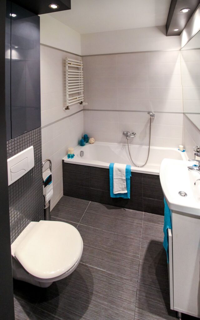 A finished bathroom with a bath, basin and toilet