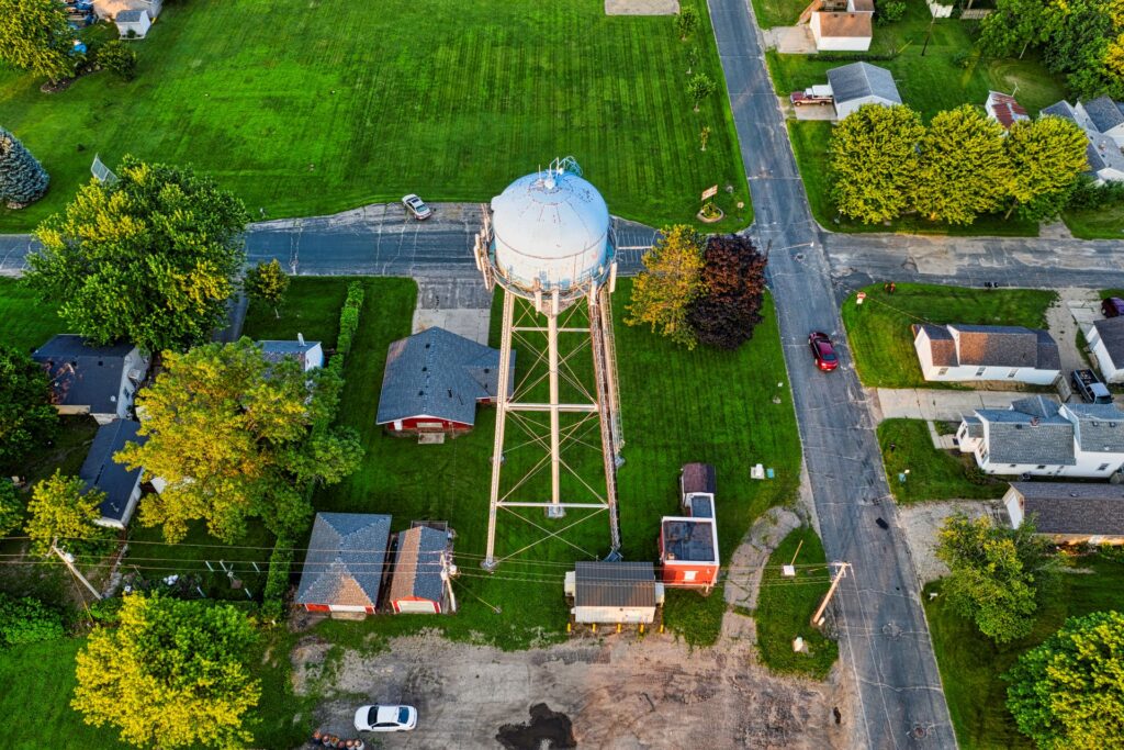 A small town water tower seen from the air