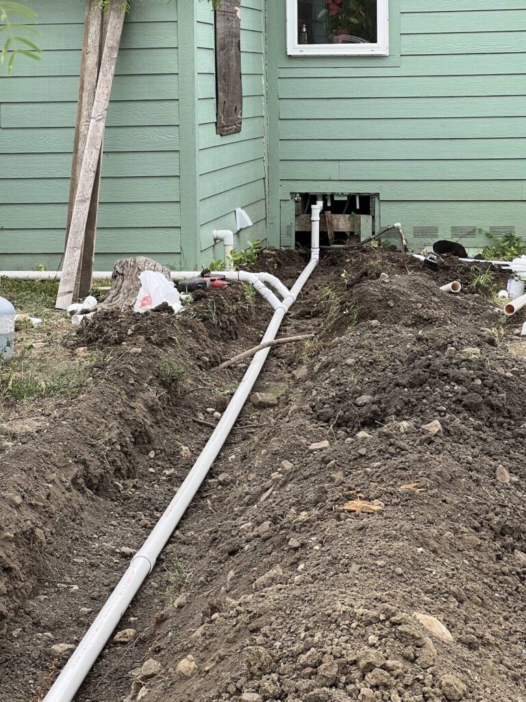 A rerouted plumbing run alongside a ranch property