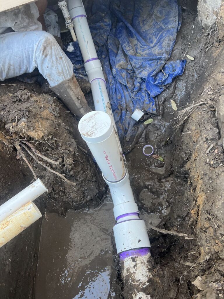 A sewer tie in during a full repipe