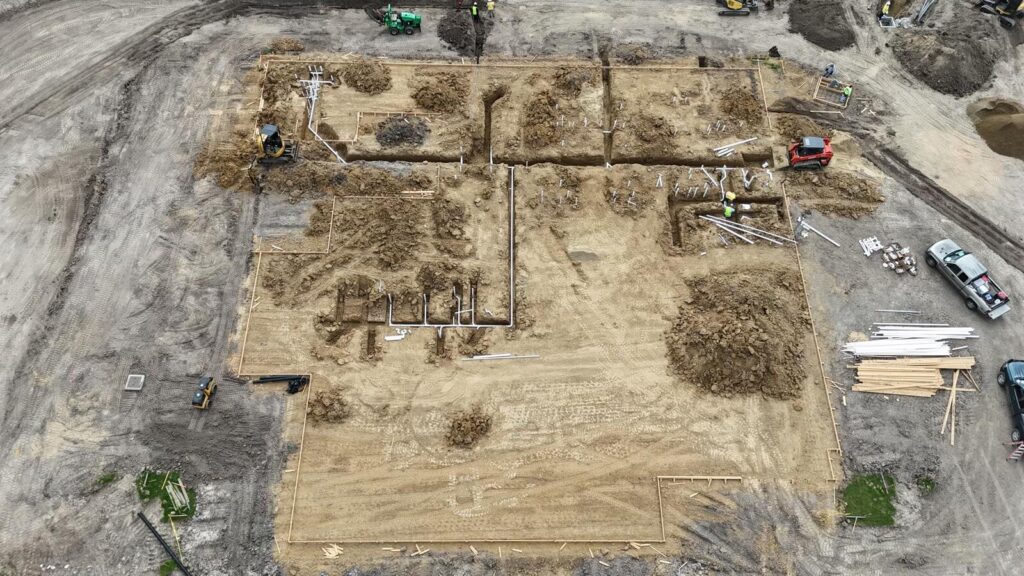 Aerial view of a slab rough in with the drainage set out