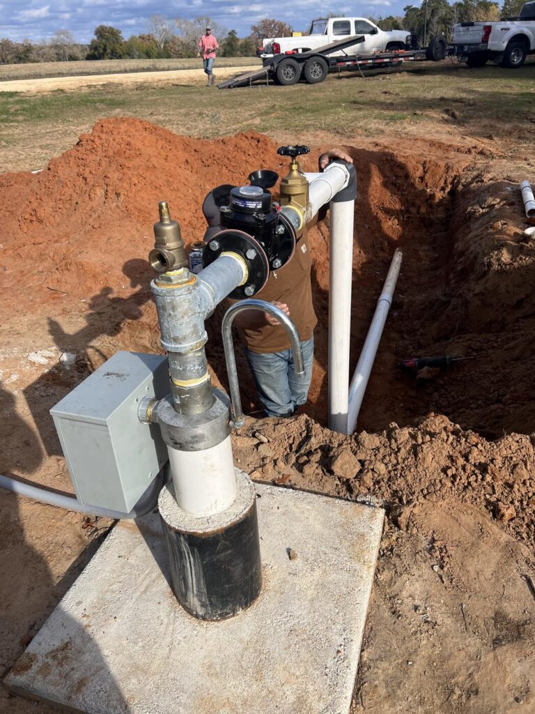 A new water service and meter set installed in a trench
